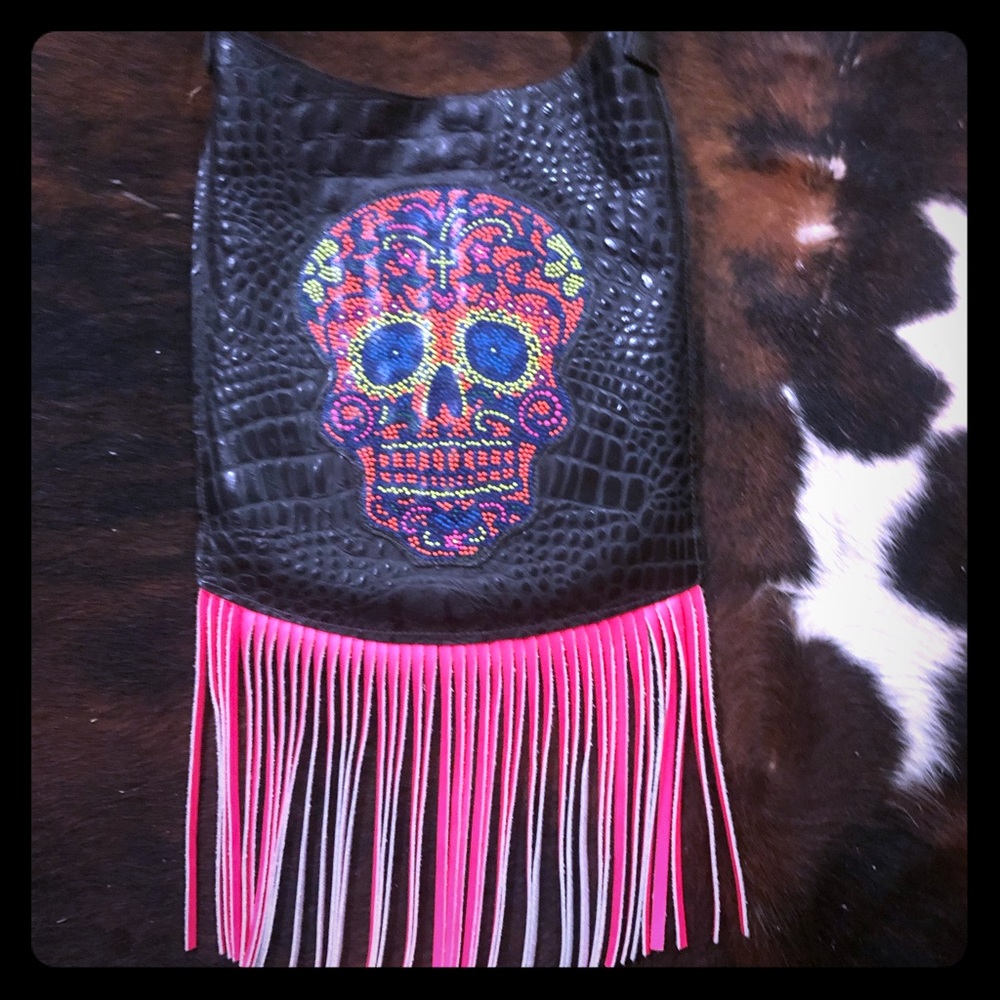 Kurtmen fringe purse with sugar skull.
